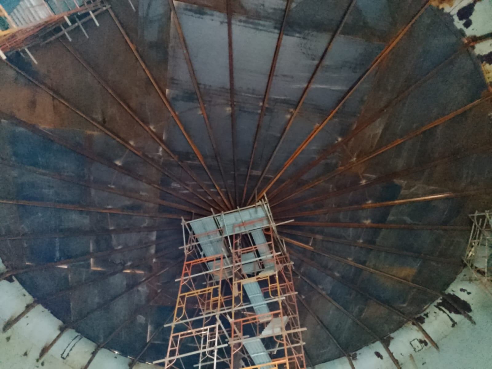 Interior view of a tank roof with new radial rafters and roof plates